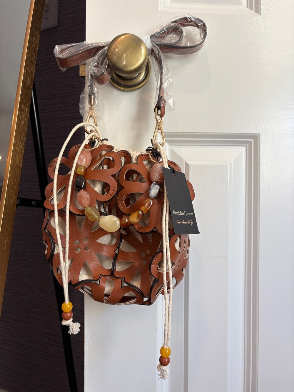 River Island Tan Floral Cutout Mini Bucket Bag with Beaded Handle